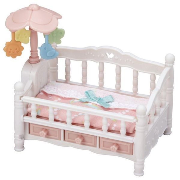 Bild von Kinderbett mit Mobile